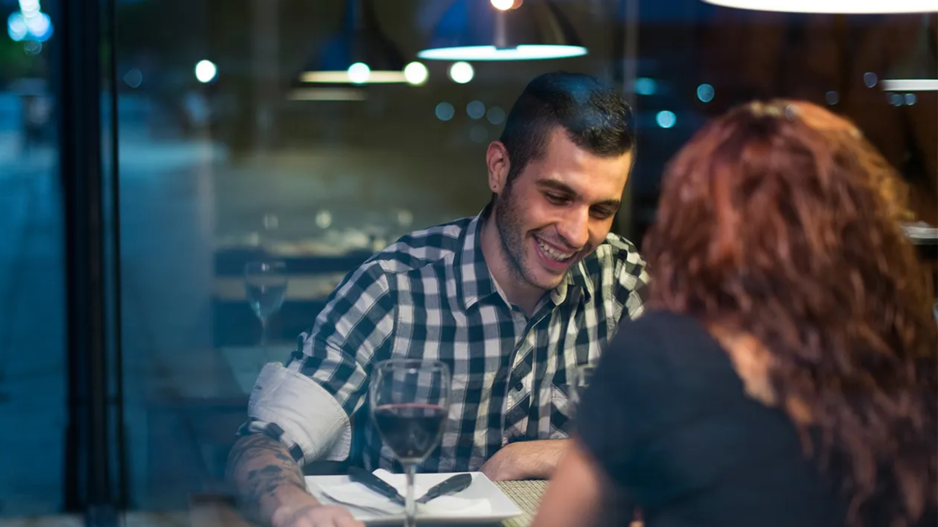 Couple having a great conversation on a date.